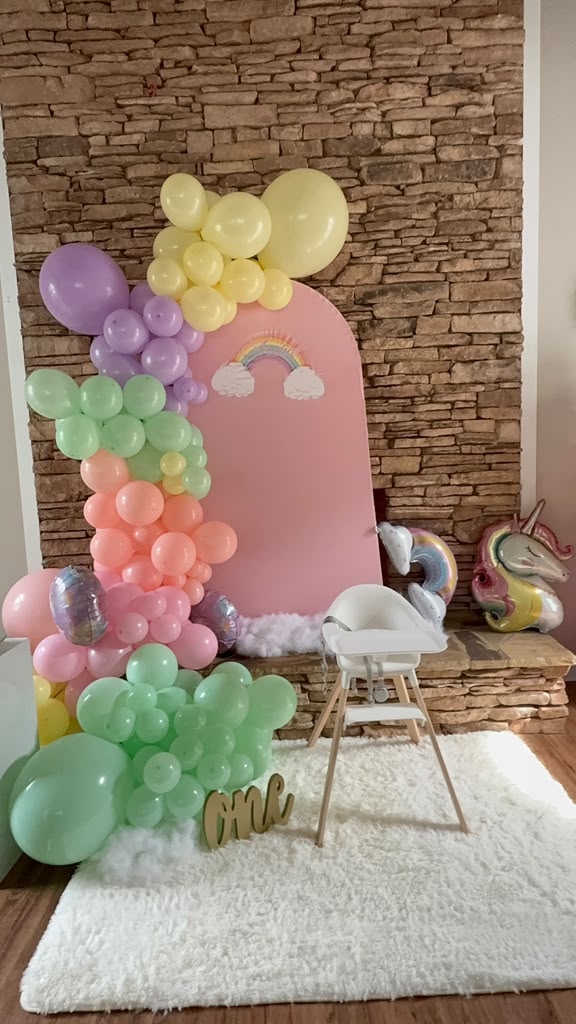 Pastel Oh Baby balloon arch with clouds for a baby shower designed by Casa-Secreta