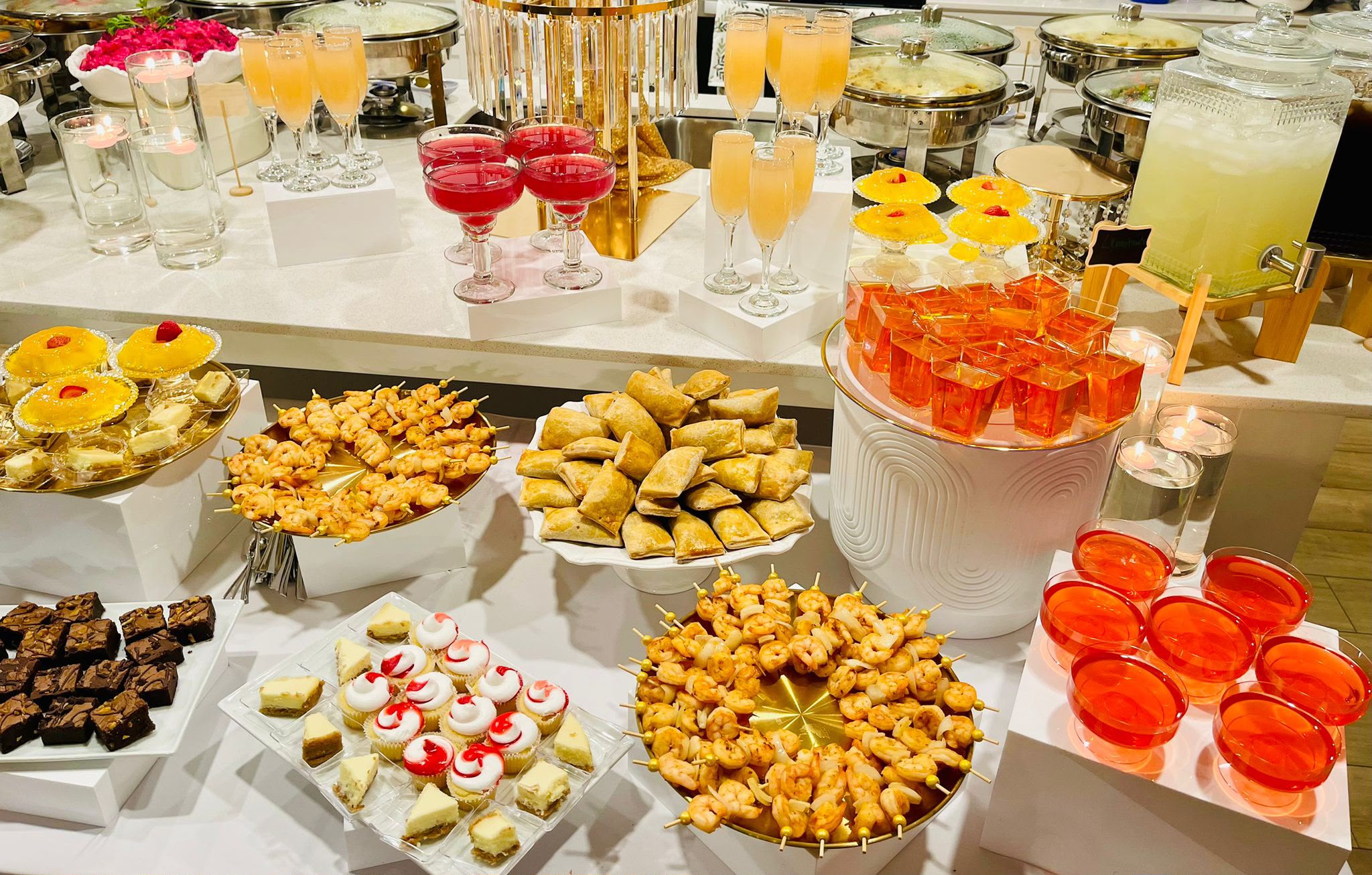 Lavish grazing dessert table with mimosas and roses by Casa-Secreta catering
